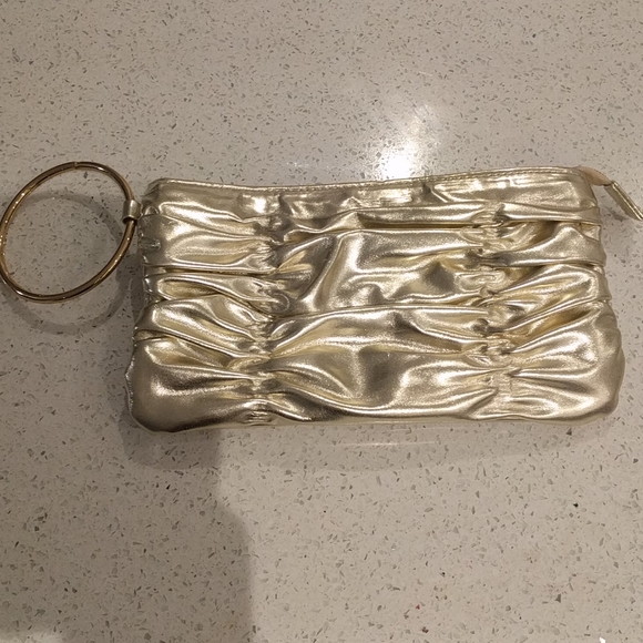Aldo Handbags - Beautiful gold wristlet by Aldo🍀🌸